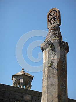 Stone cross on the top of a column in the monastery of Tatev in Armenia.