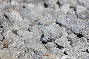 Stone crushed stone on the construction site as an abstract background