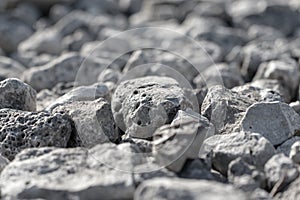 Stone crushed stone on the construction site as an abstract background