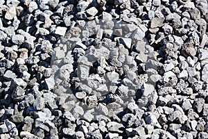 Stone crushed stone on the construction site as an abstract background