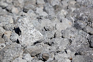 Stone crushed stone on the construction site as an abstract background