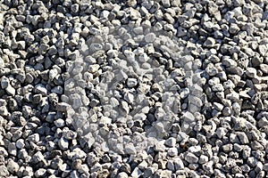 Stone crushed stone on the construction site as an abstract background