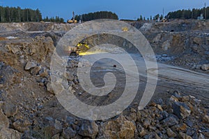 Stone crusher in a quarry. mining industry, night view