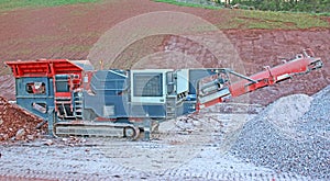 Stone crusher on a road construction site