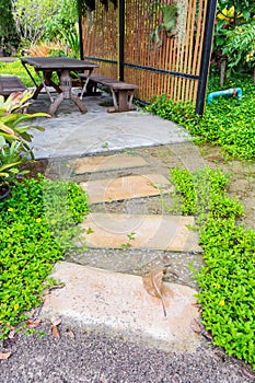 Stone curved walkway in garden