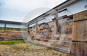 The stone defensive wall with loopholes in Osaka Castle. Osaka. Japan