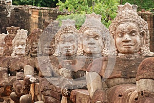 Demons of the causeway, Angkor Thom, Cambodia photo