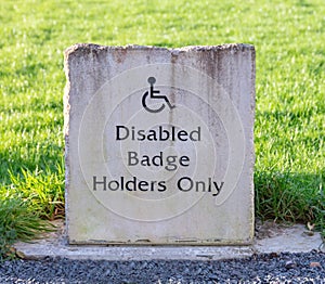 Stone Disabled Badge Holders Only parking sign