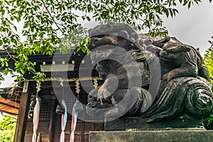 A stone dragon in a Shintoist shrine in Tokyo photo