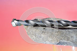 Stone drill with point for drilling in natural stone and concrete photographed in the studio