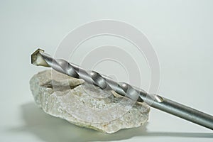 Stone drill with point for drilling in natural stone and concrete photographed in the studio