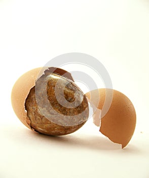 Stone egg and cracked shell