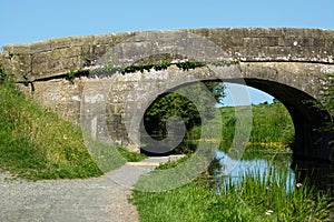 Stone elliptical bridge over Lancaster Canal, UK.