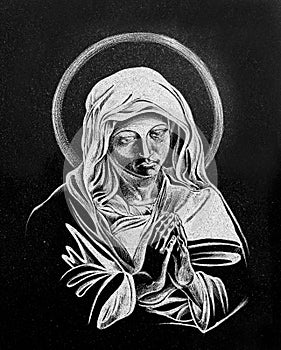 Stone engraving of Virgin Mary