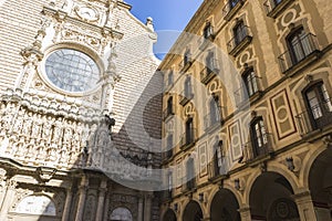 Stone facade of the Montserrat monastery cathedral in Barcelona, Catalonia, Spain