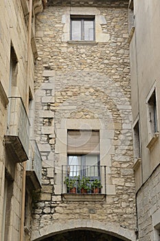Stone facade over arch
