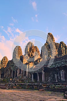 Stone face towers at Bayon temple, located in Angkor, Cambodia, the ancient capital of the Khmer empire. View from northern inner