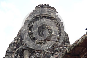 Stone faces of angkor thom, bayon, angkor wat cambodia Jayavarman VII buddha