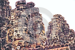 Stone faces of angkor thom, bayon, angkor wat cambodia Jayavarman VII buddha