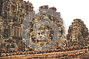 Stone faces of angkor thom, bayon, angkor wat cambodia Jayavarman VII buddha