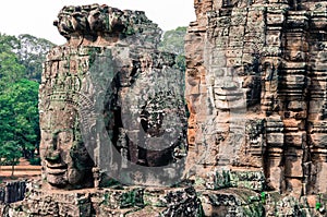 Stone faces at Bayon temple in Angkor Wat, Siem Reap
