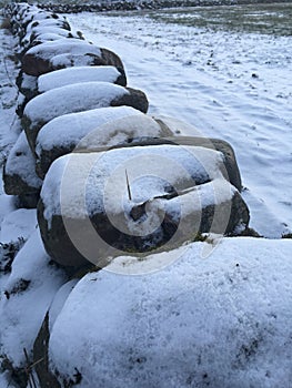 Stone fence with snow, Norway