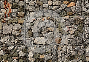 Stone fence protected by applicable Grids