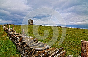 Stone fenced path to Moher Tower along the Cliffs of Moher photo