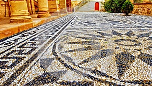 Stone mosaic in front of Church in Thimiana Chios Greece