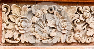 Stone flower pattern in temple of Ubud.