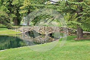 Stone Footbridge Crossing Pond In Spring Grove Cemetery, Cincinnati, Ohio