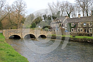 Stone footbridge landscape in cotswolds, england