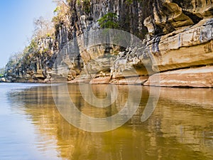 Stone formations reflected on Manambolo river, Tsingy de Bemaraha Strict Nature Reserve, Madagascar