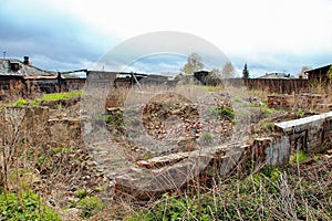 Stone foundation of an old ruined house or building