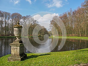Stone fountain by the beautiful pond in Kasteel De Haar
