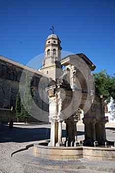 Stone fountain and Cathedral, Baeza, Spain. photo