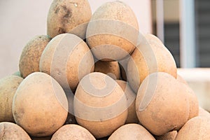 Stone fruit or stone apple for sale at local fruitstore photo