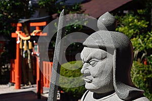 Stone god at Japanese shrine, Kyoto Japan