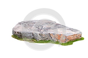 Stone on green grass isolated on white background