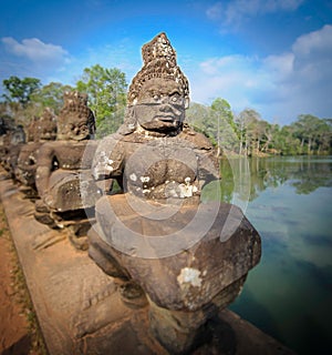 Stone guardians on a bridge at the entrance to a temple in siem reap,cambodia 3