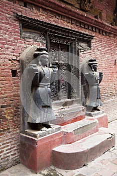 Stone Guardians, Royal Palace of Bhaktapur, Nepal photo