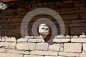 Stone head in the ruins of Chavin de Huantar, in Huascaran National Park, Peru photo