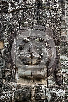 Stone head on towers of Bayon temple in Angkor Thom, Cambodia. S