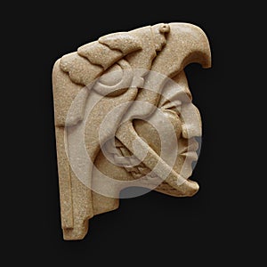 Stone head of warrior carving latin america
