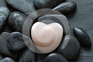 Stone heart and other stones abstract background