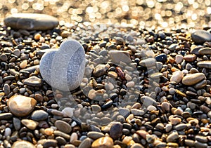 Stone Heart on Pebble Beach, Shining Ocean Water, Rocky Shore Love Symbole, Summer Pebble Heart