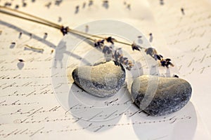 Stone hearts with old letter