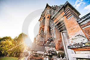 Stone hindu Temple in Bali, Indonesia. Asia religion with exotic temples and sunset