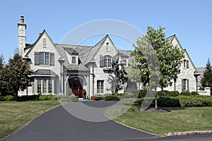 Stone home with cherry wood door