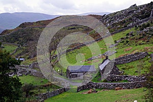 Stone house and barn near Arthog on a cloudy autumn day, Gwynedd, Wales